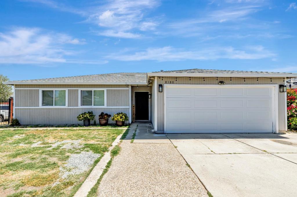 Welcome to this charming 3-bedroom, 2-bathroom home nestled in the vibrant city of Gilroy. This residence offers a cozy and functional living space. The kitchen is recently remodeled with new granite countertops, cabinets, and a laminate floor. A hardwood floor was recently installed in the rest of the house. The two bathrooms were renovated with new plumbing throughout the home. The backyard was updated with stone pavers and a new garage door with insulation. The front yard has an iron fence. The solar panels are paid off. The property includes a 2-car garage, providing ample space for parking. Located within the Gilroy Unified School District, this home is ideal for those seeking a comfortable lifestyle in a community-oriented area. Don't miss the opportunity to make this delightful house your new home in Gilroy.
