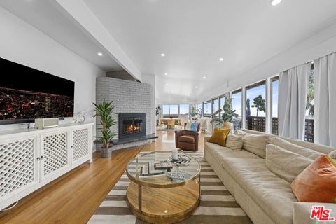 Photo of 1211 N Kenter Avenue, Los Angeles, CA 90049 (MLS # 26103036)
