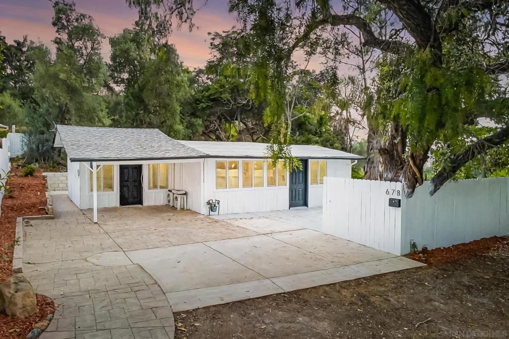 Welcome to 678 Robby Way—a stunning, fully remodeled retreat nestled on a spacious 0.36-acre lot at the end of a peaceful cul-de-sac in charming Fallbrook. This modern gem has been completely upgraded inside and out, featuring a brand-new kitchen, bathroom, roof, doors, wooden floors, paint, water heater, A/C, meter box, and even a gorgeous new outdoor courtyard with fresh cement ground—every detail thoughtfully redone for turn-key living. Inside, enjoy a sleek, open-concept layout filled with natural light, clean lines, and timeless finishes. The renovated kitchen and bath bring contemporary style, while the spacious yard offers privacy, mature trees, and space to garden, entertain, or expand. Tucked away, yet just minutes from local shops, dining, and freeway access, this home offers the perfect blend of tranquil living and modern convenience. If you're craving space, style, and serenity, 678 Robby Way is a must-see.