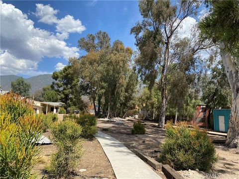 Photo of 19216 Kendell Dr, Devore, CA 92407 (MLS # IG26026128)