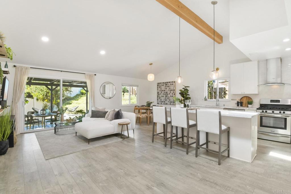 BAY PARK SINGLE-LEVEL GEM ON CORNER LOT WITH AN EXPANSIVE YARD! Beautifully remodeled and full of charm, this Bay Park single level home combines modern design with inviting indoor-outdoor living. Inside, you’ll find a modern open kitchen, stainless steel appliances, shaker cabinets, stylish light fixtures, and eye-catching decorative tile in both bathrooms that add character and warmth. The open layout makes the home feel bright and easy to live in, while the expansive yard truly sets it apart. In the rear yard, enjoy an outdoor living room–style space along with a built-in BBQ, perfect for relaxing or entertaining. The yard then wraps around to a large, private front yard, offering endless possibilities for gardening, play, or creating your own retreat. Located just minutes from Mission Bay, Pacific Beach, neighborhood cafés, restaurants, and convenient freeway access, this home offers the ideal balance of comfort, style, and location.