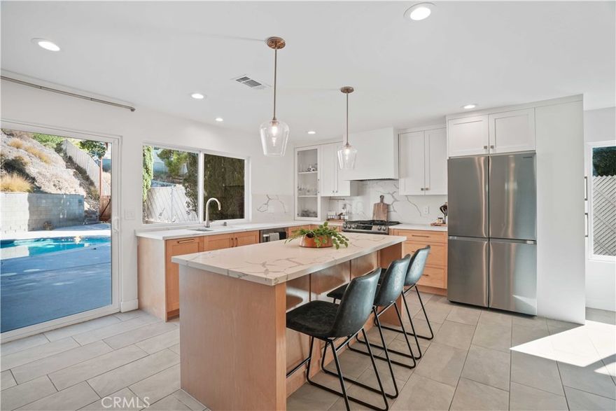 Welcome to this beautifully updated and move-in ready 4-bedroom, 3-bathroom home, offering 2,230 sq. ft. of comfortable living space—perfect for first-time home buyers seeking the ideal entertainer’s pool home! No HOA and No Mello Roos!! 



Enjoy peace of mind with major upgrades already completed, including newer copper plumbing (2022), a newer HVAC condenser (2024), and triple-pane windows brought up to code for improved energy efficiency. Inside, the home features newer vinyl plank and tile flooring throughout, recessed lighting, newer ceiling fans, and a fully remodeled kitchen (2024) with custom cabinetry and quartz countertops. All upstairs bathrooms were tastefully renovated in Fall 2023 with fresh, modern finishes.



The flexible floor plan includes a downstairs bedroom and full bath, perfect for guests or a home office. Step outside to your private backyard oasis featuring a private pool, ample side yard RV parking, and a 2-car garage—ideal for everyday living and entertaining. This turnkey home has all the space, upgrades, and features you’ve been looking for. Don’t miss this incredible opportunity, and schedule your private showing today!