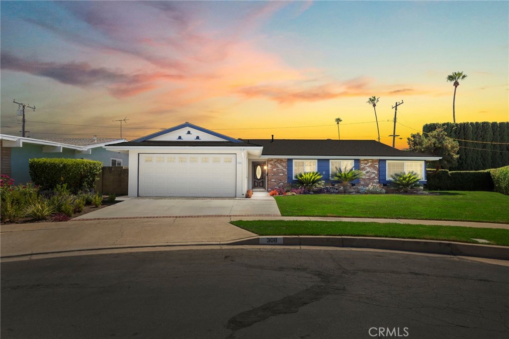 BEAUTIFUL, SINGLE-STORY home on a quiet cul-de-sac neighborhood in Placentia! This home features a bright and open floor plan with 4 bedrooms, 2 bathrooms with 1,617 square feet of spacious living space. You are welcomed at the entry into the spacious living room which features a beautiful brick fireplace and large windows for natural lighting. The kitchen includes plenty of cabinetry for storage, gas cooktop, countertop seating and is open to the family room which makes it great for entertaining. The Primary Bedroom Suite features a LARGE bedroom area and private bathroom that includes beautiful vanity with plenty of storage. Down the hall, there are 3 spacious which offer plenty of closet space, and a beautiful hall bathroom with shower/tub combo. The private backyard includes large, covered patio area and a spacious grassy area that is perfect to create your own oasis. Additional features of the property include spacious 2 car garage, newer A/C, and Solar panels to save on your electricity bills. This home is located in the Award-Winning Placentia-Yorba Linda School District, and is close to restaurants, shopping and entertainment. Come view this beautiful house and make it yours today!
