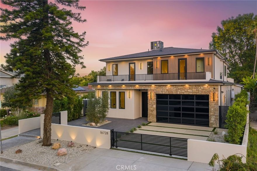 Experience an extraordinary newly constructed estate that redefines modern elegance in the heart of Encino. Completed in 2025 by one of the area’s most acclaimed builders, this architectural modern farmhouse is a sanctuary of artistry, design, and comfort. From the moment you arrive, the gated entrance and striking curb appeal set the tone for what lies beyond. Inside, soaring ceilings, a dramatic stone feature wall, and wide-plank European oak floors create a seamless blend of grandeur and warmth. Venetian plaster finishes, designer lighting, and custom millwork highlight the impeccable craftsmanship throughout. The gourmet kitchen is nothing short of breathtaking, showcasing imported porcelain countertops, an oversized island with smart storage, professional-grade appliances, and a wine & beverage cooler. The dining room dazzles with a built-in glass display cabinet with sleek black framing and soft backlighting, a gallery-like feature perfect for luxury dining, the expansive family room centers around a statement fireplace, evoking the serenity of a Tulum resort while capturing the sophistication and relaxed elegance of modern California living.The private backyard five-star retreat includes: sparkling pool & spa, outdoor kitchen with BBQ, bar seating, and a covered patio with heaters, perfect for year-round entertaining. A 2-bedroom ADU offers complete independent living with its own kitchen, bathroom, and living room. With both a private side entrance and sliding doors to the backyard, ideal as a guest house, office, or pool cabana. The main level also features a cinema room designed for the ultimate movie night experience, ensuite guest bedroom, mudroom & a stylish powder room. Ascend the floating staircase, accented by an impressive indoor garden seamlessly blended into the floor design & illuminated with lighting, leading to 4 spacious ensuite beds upstair, including a luxurious primary retreat with a rooftop-style balcony, fireplace, oversized walk-in closet, and spa-inspired bath with soaking tub, dual rain shower, and dual vanities. Additional amenities include a smart home system with speakers, security cameras, alarm, and gated driveway with intercom. Located within the Encino Charter Elementary district and moments from Ventura Blvd’s premier dining and shopping with effortless freeway access, this estate embodies the best of design, lifestyle, and location. This is not just a home, it’s a statement of elegance, artistry, and elevated living.