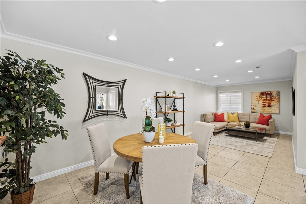 Welcome to this beautifully upgraded single-family home in the desirable Orange Tree neighborhood of Irvine!! Boasting dual master suites; one on the main level and one upstairs—this versatile floor plan is ideal for multi-generational living or hosting guests.
Step through the custom double-panel entry door into a warm and inviting space featuring a comfortable living room, open dining area, main-floor primary suite, and a remodeled kitchen with a breakfast bar and nook. The open-concept kitchen showcases granite countertops, glass-front cabinets, and stainless-steel appliances including a double oven, dishwasher, microwave, refrigerator, wine cooler, and water purifier.
Upstairs, you’ll find a second primary suite and a third bedroom—both with access to a shared private balcony, perfect for enjoying a quiet morning coffee or a peaceful evening breeze.
The main-level primary bathroom features new fixtures, while the upstairs suite boasts a travertine-surround shower, recessed lighting, and a new vanity mirror and lighting.
The home is tastefully upgraded throughout with tile flooring downstairs, wood laminate flooring upstairs, crown molding, baseboards, and decorative interior columns that add character and charm. Recent improvements include fresh interior and exterior paint, recessed lighting, new light fixtures, ceiling fan, new window coverings, and updated exterior lighting in both the front and back.
Additional highlights include a 2-car attached garage with fresh paint, new epoxy flooring, and custom built-in cabinetry. The new landscaped front yard features a drip irrigation system, a gated side area perfect for RV or third-car parking, and a gated storage space.
Enjoy access to fantastic community amenities just a short walk away, including 2 pools, jacuzzi, clubhouse, fitness center, lighted tennis and pickleball court, and playground. With low HOA dues of $228/month, no Mello Roos, and a location within walking distance to Irvine Valley College, with easy access to UCI, the 5, and 405 Freeways, this is a rare opportunity to own a move-in-ready home in the heart of Irvine!