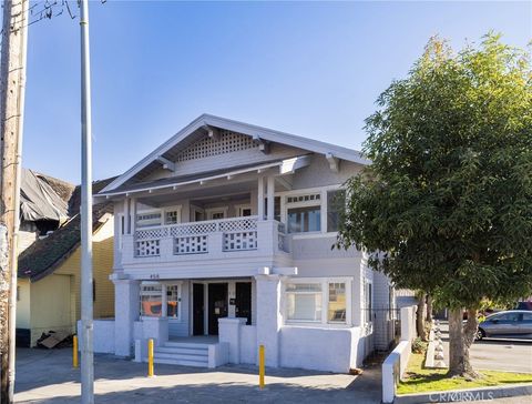 Photo of 458 W Vernon Ave, Los Angeles, CA 90037 (MLS # AR26037826)