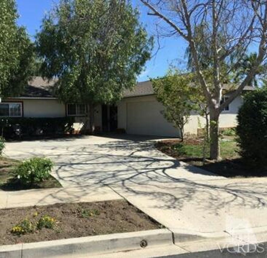 Remodeled Ranch style residence - featuring granite countertop, stainless steel appliances, and updated cabinetry in kitchen ** Remodeled bathrooms, Dual paned windows, recessed lighting, newer HVAC, new roof, and scraped ceilings make this a must see!!
