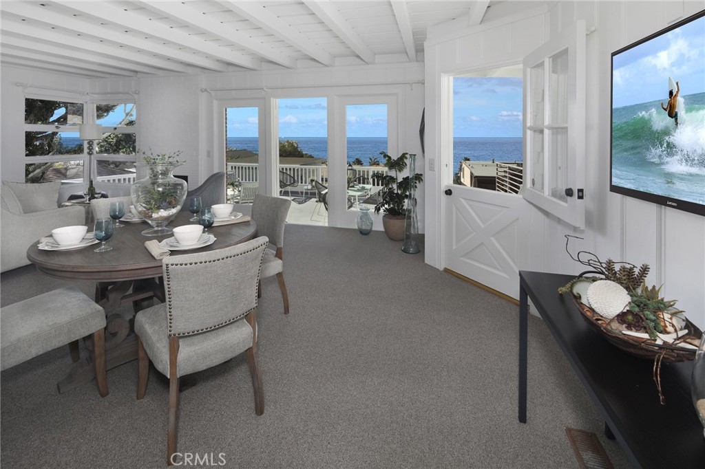 This CLASSIC BEACH HOUSE COTTAGE with PANORAMIC OCEAN AND CATALINA ISLAND VIEWS is situated in Upper Victoria Beach. The property
boasts open beamed ceilings with vintage coastal decor, newer appliances, a total of 3 Bedrooms plus a cozy den which opens to Kitchen and 2.5 Baths.
Property has near-new wood look laminate flooring in all rooms upstairs except Kitchen and Den.
There are two fireplaces and the Living Room opens to a large deck perfect for entertaining and enjoying the amazing Catalina Sunset Views. The home includes an inside Laundry Closet with stacked washer/dryer. In addition, there is a two Car Garage. The upstairs features 2 Bedrooms and 1.5 Baths and the separate downstairs includes a 3rd Bedroom with Bath, a fireplace, and a Kitchenette. This space is perfect for a work-at-home separate office or for guests/mother-in-law quarters. Located minutes close TO VICTORIA BEACH or catch the Trolley to the shops of Laguna Beach, Restaurants, and Festivals.
Enjoy the fun beach lifestyle all year around living in Laguna Beach. PROPERTY IS UNFURNISHED and available for long term lease.