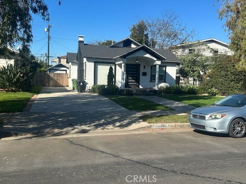 Photo of 4041 Denker Ave, Los Angeles, CA 90062 (MLS # DW26032900)