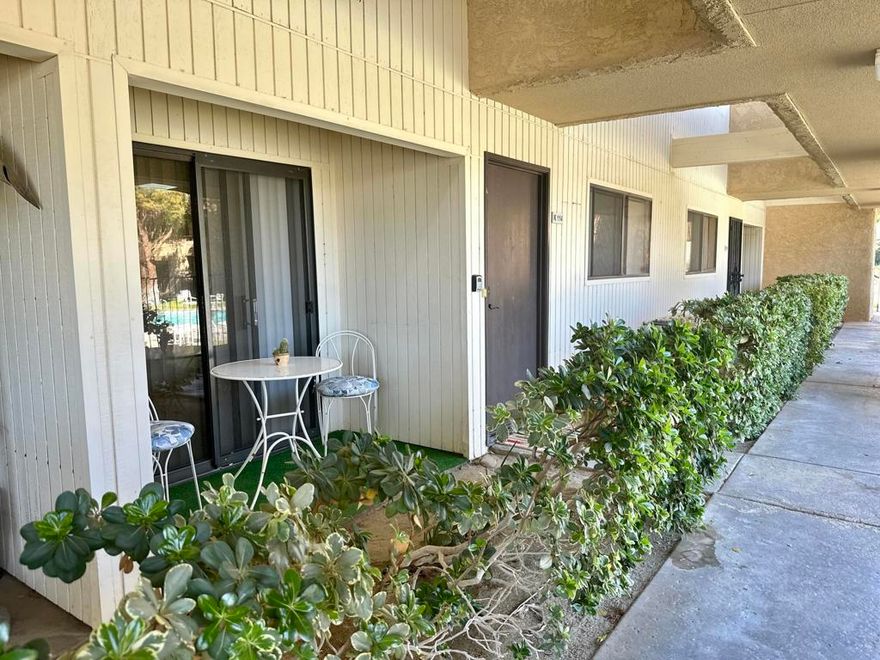 This lovely updated ground floor unit located in building K, is just steps away from the heated pool/jacuzzi and convenient to two tennis/pickle ball courts. The kitchen has been updated with newer cabinets, counter tops and stainless steel appliances. The flooring is modern stone tile and flows throughout the unit. The covered balcony is a great area to enjoy the beautiful desert weather while taking in the views of the pool, mountains and green belt. The Palm Springs Villa's 11 is in a secure gated all family community.  There are  8 swimming pools, jacuzzi's and several tennis/pickle ball courts for your enjoyment. Conveniently located near downtown Palm Springs and the Palm Springs Aerial Tramway.
