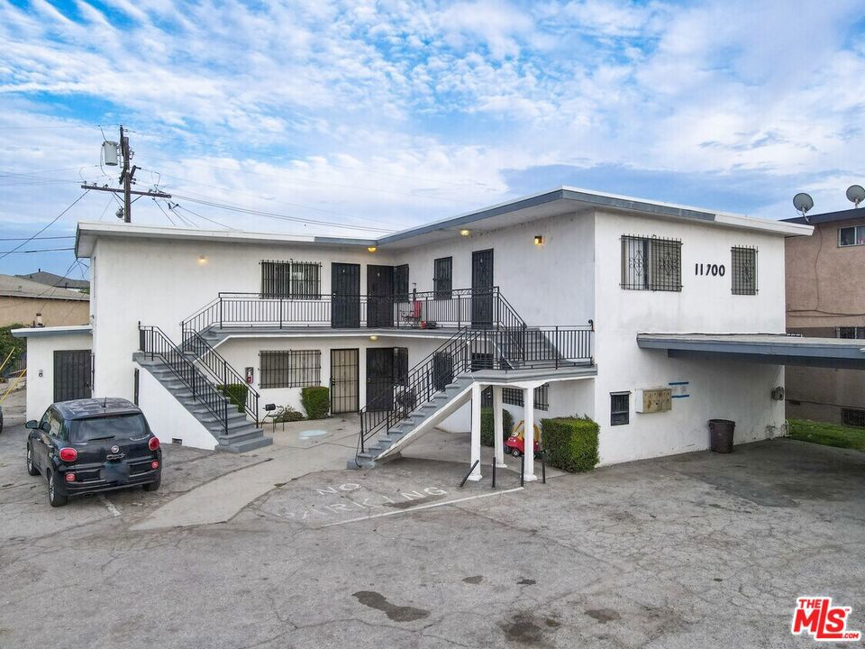 6-unit multifamily investment property located at 11700 South Normandie Avenue in the 90044 zip code of Los Angeles. The 3,648 square foot subject property sits on a 8,112 square foot lot and with close proximity to the 105 Freeway as well as multiple educational institutions such as Los Angeles Southwest College, Saint Frances X Cabrini Catholic School, and West Athens Elementary, making it a perfect living place for tenants with children, or those continuing their higher education. The subject property has a very attractive unit mix of all 2 Bedroom / 1 Bathroom units and is currently 100% occupied. Five of the six units are being occupied by Section 8 tenants, providing a new investor stable and secure income . The subject property sits in one of LAs Qualified Opportunity Zones, which enables the new investor the opportunity to forego all capital gains taxes on the exit after ample renovation and a 10-year hold. Another way a savvy investor could add significant value would be to utilize the new ADU program that was rolled out state-wide at the beginning of 2020. The program would allow the addition of two, 2 Bedroom / 2 Bathroom units which would generate roughly $50,000 of extra rental income every year and add around $600,000 of property value. This new program is being utilized all over the city as it has offered investors an easy road map to increase income.