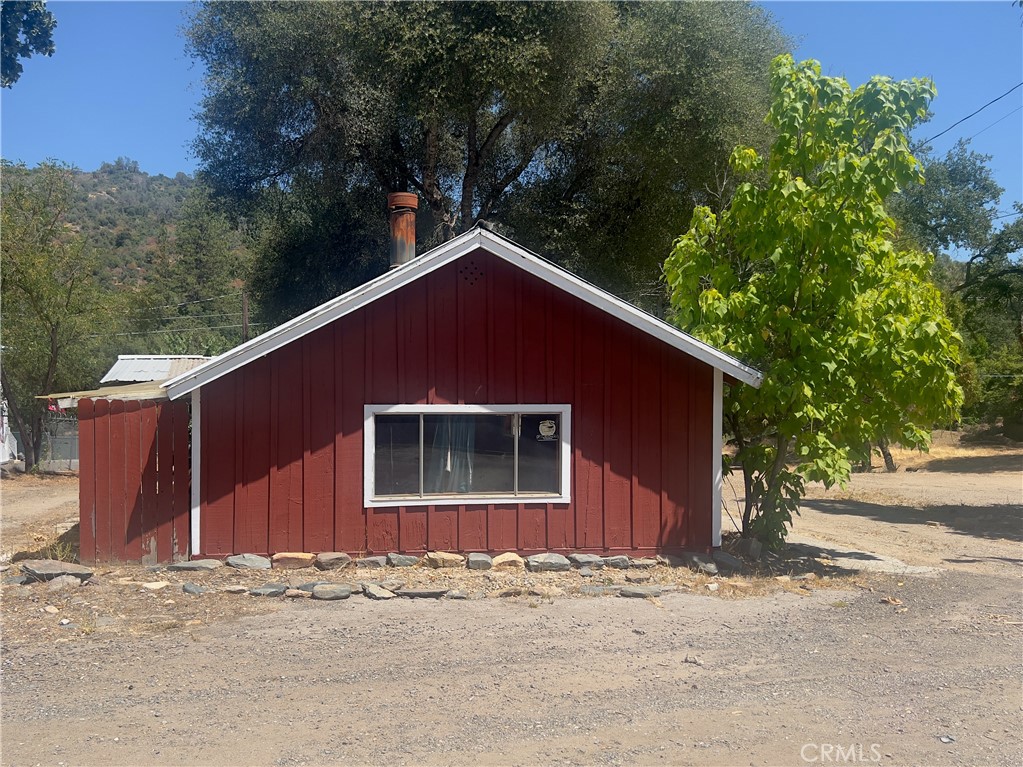 Calling all Entrepreneurs to check out this rare investment opportunity! Two parcels together, zoned CRM. Hwy 41 access. Side road access to back gate, leading to small building. Property features : 2 wells, one being brand new with all new wiring, newer septic, new custom ranch fence new carpet, new pellet stove. This is part of Oakhurst history, used to be a nursery. What are your ideas? Short term rental cottage, nursery, retail shop, residence, tow yard, cafe? The possibilities are endless. Bring your vision and your agent and come check it out.