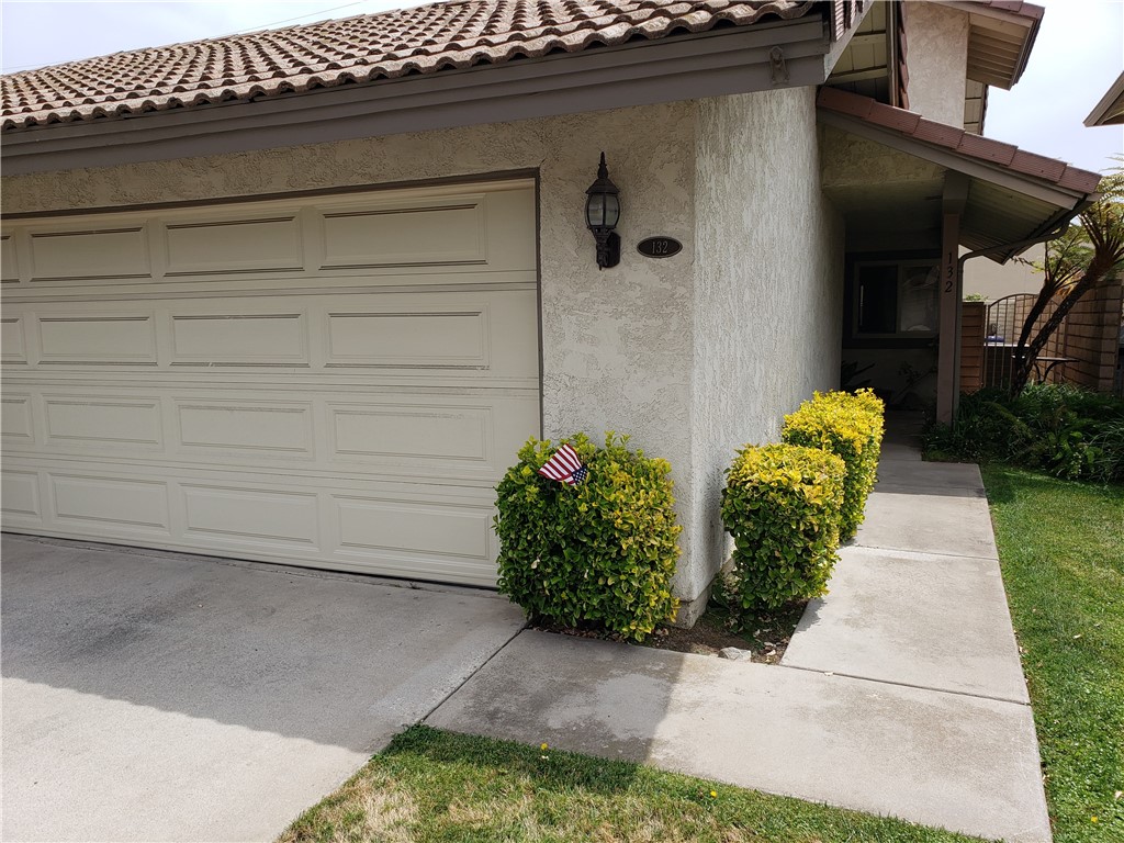 Prime Location with Single-Family Feel! Welcome to this immaculately maintained condo that truly lives like a single-family home. Nestled near top-rated schools, premier shopping, dining, and major freeways, this gem places everything you need just minutes away. Featuring a private side and backyard, enjoy the serenity and space rarely found in a condo setting. The oversized two-car garage comes complete with convenient washer and dryer hookups. Need a downstairs bedroom? You're covered—this home includes a spacious main-floor bedroom and full bathroom ideal for guests or multi-generational living. Don’t miss out on this stunning home—it’s not just a condo, it’s a lifestyle. Come see the beauty for yourself!