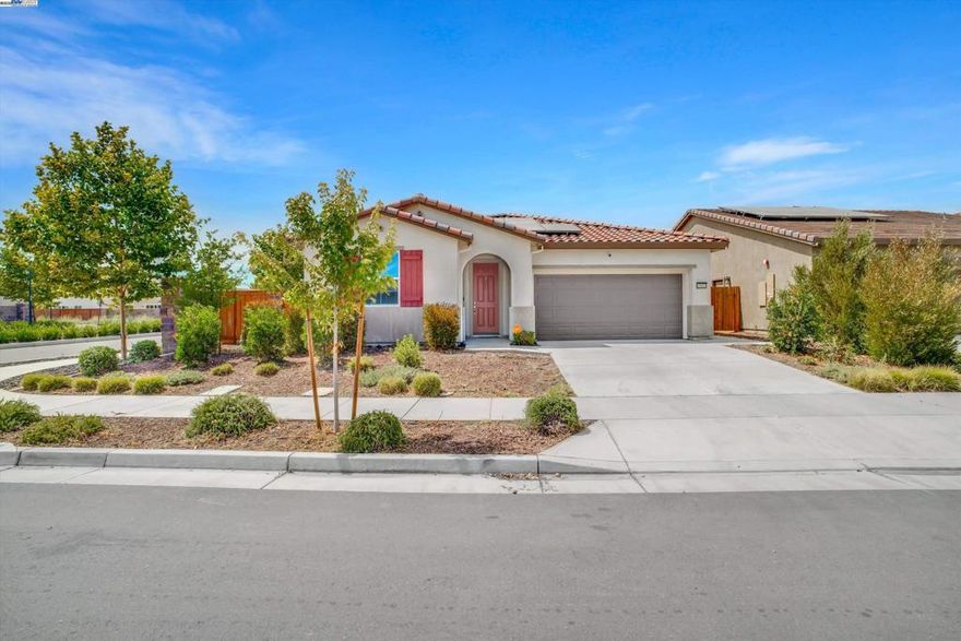 Welcome to 15455 Folktale Way, Lathrop — a beautifully maintained single-story home located in the highly desired Stanford Crossings community, built in 2022. This 3-bedroom, 2-bath home sits on a premium corner lot with no backyard neighbors for added privacy. The kitchen features granite countertops, white cabinetry, and stainless steel appliances. Enjoy a finished backyard ideal for relaxing or entertaining. Designed for energy efficiency and peace of mind, the home includes 30 solar panels and 2 Tesla battery packs — say goodbye to high energy bills and blackout worries. Conveniently located near parks, trails, restaurants, retail, and the San Joaquin River, with quick access to I-5, 120, and 205 freeways. A perfect blend of comfort, convenience, and sustainability — don’t miss this one!  **Seller is open to providing closing cost incentives towards closing costs and buy down.**