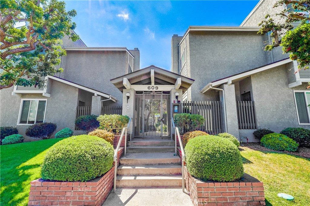 Perched atop a peaceful hillside in Redondo Beach, this elegantly renovated townhome combines modern luxury with everyday comfort. Expansive views, soaring ceilings, and an abundance of natural light create a refined yet inviting atmosphere. The living room showcases a dramatic fireplace, vaulted ceilings, recessed lighting, and architectural beams, while the sleek chef’s kitchen offers stainless steel appliances, premium fixtures, and contemporary finishes. A generous west-facing balcony brings ocean breezes and extends the living space outdoors—perfect for entertaining or enjoying sunset views. The stunning primary suite is perfect for the fashion minded, with a built-in wardrobe and designer closet. Blending convenience and style, the home features a private two-car garage with direct access, in-unit washer and dryer (new in 2024), custom closets, 220V car charger hookup, and other thoughtful upgrades. The community is beautifully maintained and includes resort-style pool for year-round enjoyment. Situated within the highly acclaimed Redondo Beach school district, this residence offers the perfect balance of turnkey luxury living and family-friendly functionality in one of the South Bay’s most desirable locations. Make it yours today.