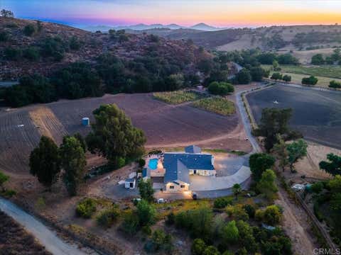 Photo of 20625 Sutherland Dam RD, Ramona, CA 92065 (MLS # NDP2608088)