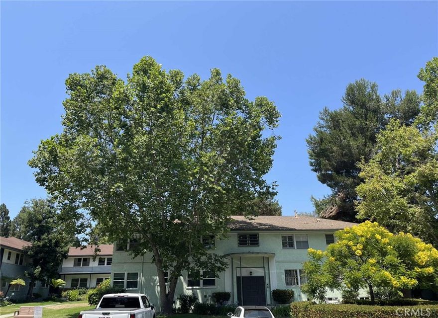 Welcome to Cameo Woods, a peaceful, green oasis just minutes from downtown Culver City and the Metro Expo Line, with easy access to downtown LA, LAX, parks, and the beach. This sunny two bedroom, 1.5 bath is the only top floor unit with no shared walls currently on the market and is nestled in a lushly landscaped gated community with 24hr security. The community boasts resort-style amenities including a heated swimming pool, two hot tubs, clubhouse, tennis court, dog park, ample guest parking, laundry rooms with brand new machines, and plentiful green spaces with mature trees. This unit conveniently has an in-unit washer/dryer and a 1-car private garage with new automatic opener. This bright home has generous closets and wood cabinetry, tasteful updates in the kitchen and bathrooms, and newer name brand stainless steel suite of appliances.