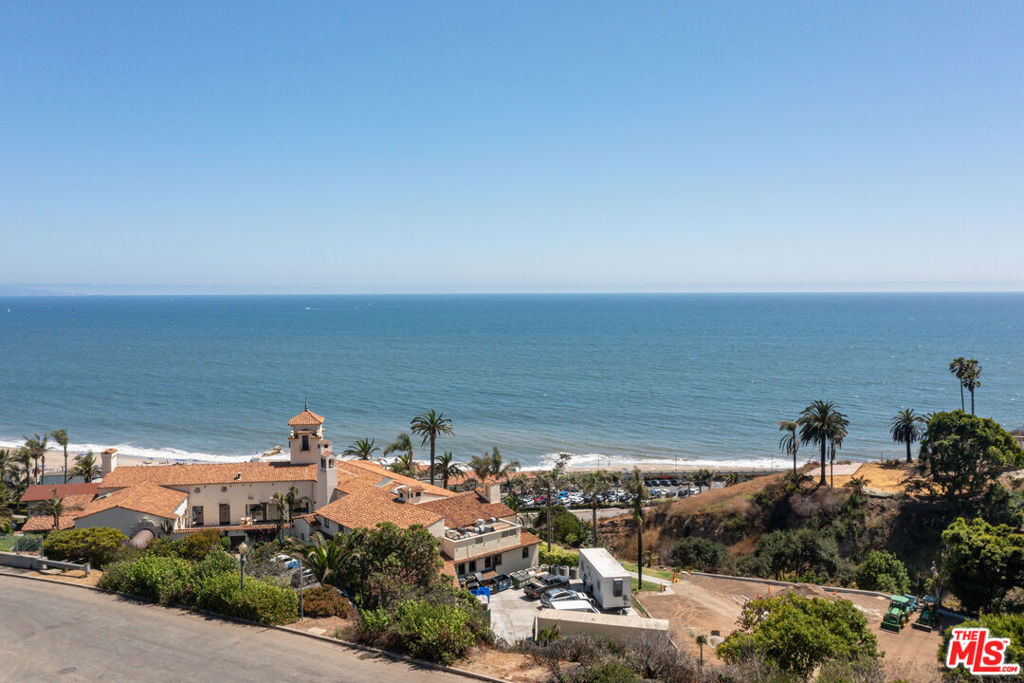 Exceptional rebuild opportunity nestled above the Bel-Air Bay Club in Pacific Palisades. Enjoy unparalleled and breathtaking panoramic white water views of Palos Verdes, Santa Monica, and Catalina Island while listening to the waves rolling in from every room. Pre-Design plans and Structural Report are available for review. Build using the existing footprint or expand with a new design. Do not miss this rare opportunity to live with exceptional views and peaceful surrounding.