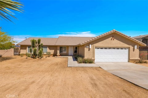 Photo of 8469 Deer Trl, Yucca Valley, CA 92284 (MLS # JT26200872)