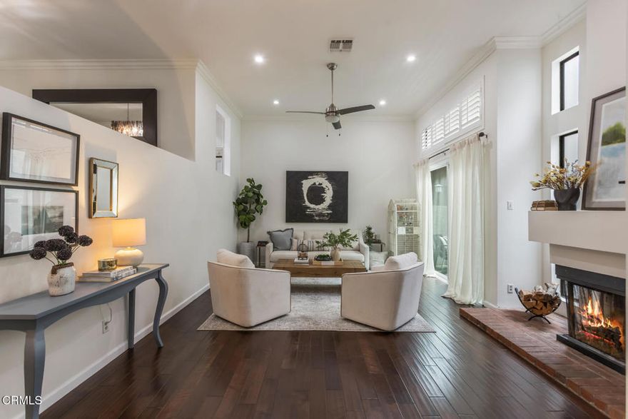 Discover the perfect blend of style, comfort and functionality in this multi-level townhouse located in the heart of Valley Village. Offering 3 bedrooms and 3 bathrooms, this residence welcomes you with soaring ceilings, recessed lighting, and an abundance of natural light from dramatic windows and skylights. The main living area features a cozy fireplace and a private patio, creating the perfect spot to relax or entertain. A separate dining space opens to a charming balcony, while the thoughtfully designed kitchen offers granite countertops and generous storage. The primary suite is complete with vaulted ceilings, a fireplace, and private balcony. The versatile lower-level bonus room can easily adapt to your lifestyle; ideal as a guest bedroom, office, or media room. Additional amenities include in-unit laundry, direct access to the unit from the secure community garage, and a peaceful setting within a 9-unit complex. Perfectly situated near the 101 and 170 freeways, this townhome offers both elegance and convenience, with quick access to West LA, and surrounding neighborhoods.