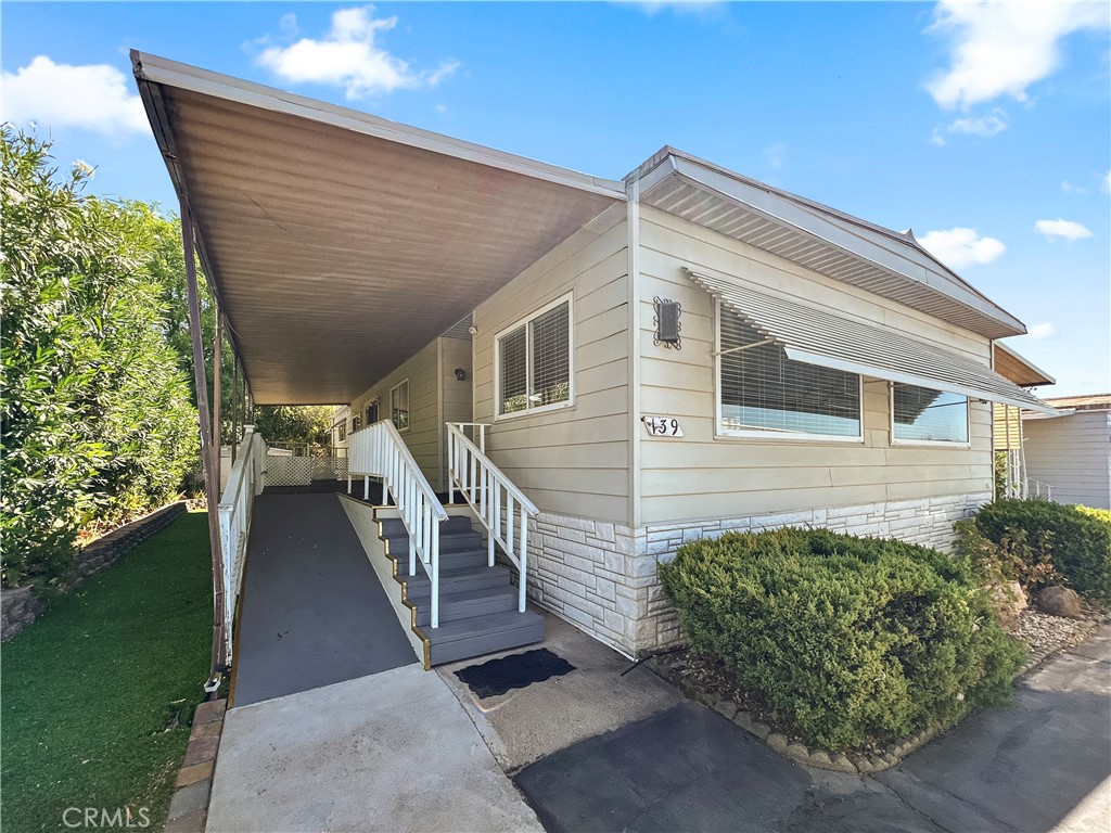 Located in the highly desired Olive Hill Senior Park, this spacious two bedroom, two bathroom home offers 1,440 sq. ft. of comfortable living space. The oversized living room provides plenty of space for entertaining or relaxing, while the kitchen has a large island, tons of counter space, and plenty of cabinets for all your storage needs. Both bedrooms are oversized, with the primary suite featuring a walk-in closet and a private bathroom. Olive Hill 55+ community offers excellent amenities, including a clubhouse for social gatherings, a dog park for furry friends, and a refreshing swimming pool for warm summer days. Conveniently located near shopping centers, Starbucks, Lake Oroville, and Oroville Hospital, this home makes it easy to enjoy the area.