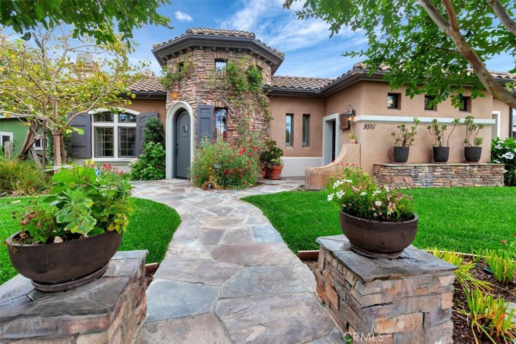 WELCOME to NEWPORT HEIGHTS!!! Beautiful custom Mediterranean style Villa is all you could desire for your family home. Unique feature is a central private courtyard. This home currently features 2 of the 5 bedrooms upstairs with a great loft area perfect for studying or relaxing. Beautiful custom cabinetry is abundant and it's such a plus to have so much storage space. A full bath accompanies this section of the home. Master Bedroom and large master bath are located on the first level which features the 3rd fireplace and french doors access to the pool and spa. There is a separate wing with separate entrance that could be a large office/bonus room/gym/game room/in-law/maids quarters room that could even be 2 more jack and jill bedrooms with a full bath. The possibilities of this suite are endless. The kitchen is a chef's dream. Imagine creating from favorite menu while you're watching the kids in the pool!! There is a butler's pantry with a freezer and so much storage to make your life easier. Separate Laundry room with washer and dryer included is featured in this section of the house with direct access to your 2 car garage. More storage!!!! Hickory and travertine floors on the main level. 10' High ceilings. Top of the line appliances: Bluestar 8 burner gas rage and oven, Subzero refrigerator,Thermador,dishwasher, Monogram 2 refrigerator drawers. Kitchen island with granite counter. The very private outdoor pool/spa area is perfect for those warm summer nights al fresco BBQ's. A separate private open courtyard has 9 French doors that open to 1st level rooms. Every room boasts the true meaning of Light and bright!! In close proximity to the upper Newport Bay Nature Preserve, Fashion Island (for world class shopping), Balboa Island & Peninsula (for boating, waterfront dining, incredible beaches, and boutique shopping) and 17th Street (for retail, bars, restaurants and fitness).Minutes away from top-rated schools including Ensign and Newport Harbor. Quick access to PCH, the 73, and the 405 freeways for commuting, John Wayne airport less than 10 minutes away. Handicap access via ramp from street. Tons of storage. Gardener and pool/spa maintenance included. All said and done this home is the most fantastic Entertaiment home of the century. From graduation parties, family gatherings or a celebrations you will be the proud hostess with so many rooms to accommodate your guests. Experience coastal living in this stunning estate