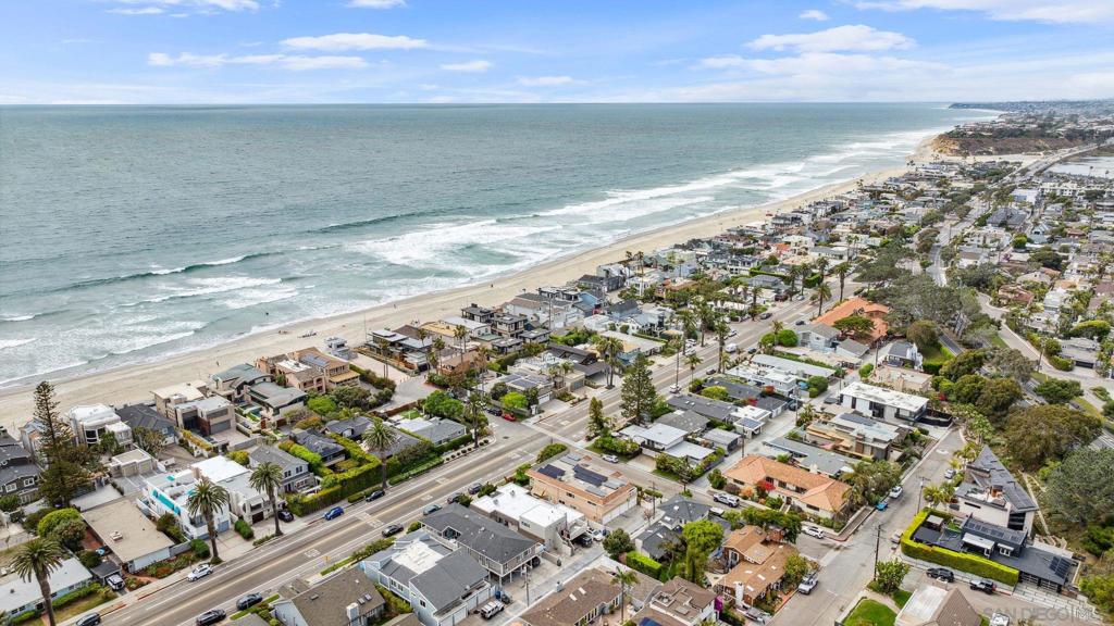Coastal Triplex Gem in the Heart of Del Mar Beach Colony! Just 150 steps to the sand, this rare and exceptional triplex offers the ultimate coastal lifestyle in one of Southern California’s most sought-after beach communities. Situated in the heart of Del Mar’s iconic Beach Colony, this premier investment opportunity features two spacious 3-bedroom, 2-bath units—each with its own private ground-level patio, ideal for relaxing, entertaining, or rinsing off after a day at the beach. Above the main units is a charming studio, offering flexible potential as a guest suite, rental, or cozy personal retreat. In the back of the property, you'll find off-street parking and a shared laundry area, making this triplex as functional as it is desirable. Whether you’re looking to generate strong rental income, create a family beach compound, or live in one unit while renting the others, the layout supports a wide range of lifestyle and investment goals. Steps from world-class beaches, Del Mar Village, local cafés, shops, and the famed racetrack, this is beach living at its finest. Properties like this rarely come available in the Beach Colony—don’t miss your chance to own a true slice of Del Mar’s coastal charm!