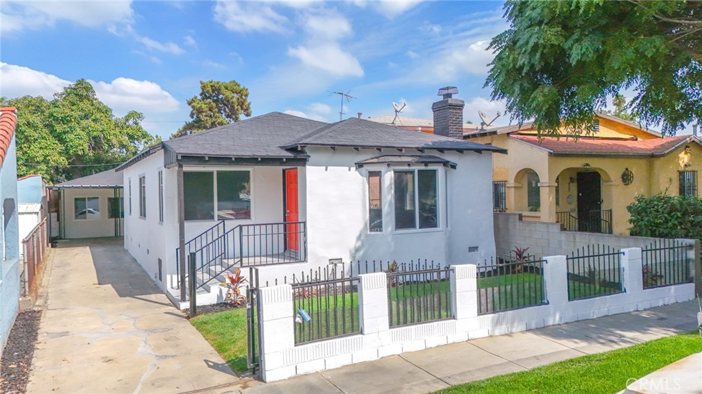 2 ON A LOT ~ Recently Remodeled ~ 3Bed/2Bath front unit + 2Bed/2Bath back unit + Bonus Single/Converted Garage. Beautiful kitchens with granite countertops, updated bathrooms, Tile flooring in Living Rooms, Kitchens, Hallway’s and Baths, New Carpet in Bedrooms. Uncovered front driveway plus uncovered rear alley access. Freshly painted interior and exterior.