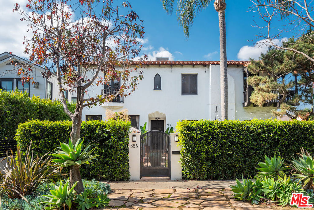 Opportunity knocks with this timeless Spanish-style top-floor duplex unit, nestled in one of La Jolla Avenue's most coveted corners. Boasting unmatched curb appeal and vintage charm, this home has been thoughtfully restored to preserve its rich character while offering modern comforts.With vaulted ceilings and natural light pouring in from every angle, the unit features two spacious bedrooms and two updated bathrooms. A stylish bar area invites you to entertain in the expansive living space, complete with a decorative fireplace and graceful archways. The home retains its original tile-work and wrought iron fixtures, adding a sense of history to the home's unique design.Step outside to your private deck, where sweeping views of the Hollywood Hills and the iconic Hollywood Hills skyline awaiting in an ideal spot to relax and enjoy the breathtaking surroundings. This home also offers the convenience of in-unit laundry, central air conditioning, and the potential for seamless connection with the downstairs unit through the interior staircase.Located just moments from the vibrant shops, restaurants, and boutiques on Melrose Avenue and Santa Monica Boulevard, this is a rare opportunity to experience the best of West Hollywood living with the elegance of classic Spanish architecture. Don't miss your chance to call this stunning space home.