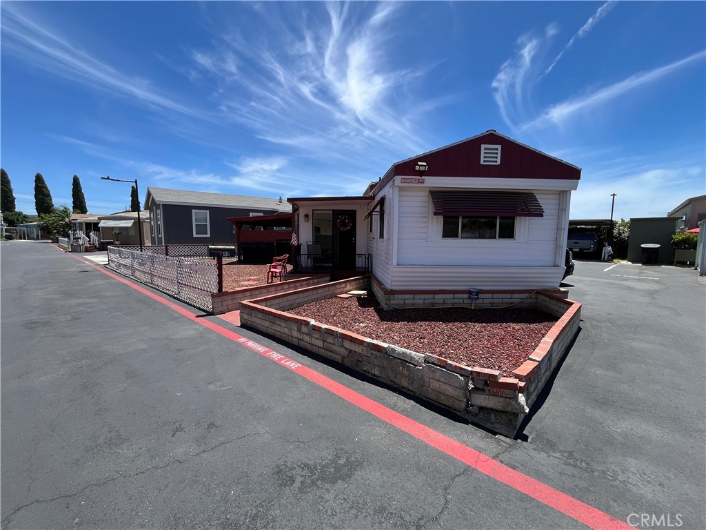 This well located and affordable mobile home is full of potential! It features a cozy 1 bedroom, 1 bathroom layout with a functional living room, ideal for a minimalist lifestyle or creative redesign. The kitchen offers ample storage, and the home includes a dedicated in unit laundry room. The property has been left mostly original by the previous owners, giving buyers the opportunity to update and personalize. Outside, enjoy a small storage shed, and a generous yard perfect for pets. Located in a pet friendly park with amenities including a pool, clubhouse, guest parking and, close to shopping, dining, and freeway access. This home could be a perfect fit, don’t miss your chance to make it your own!