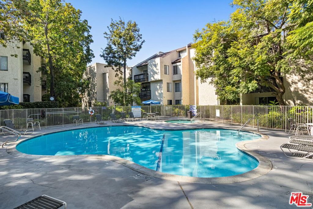 First time on the market in over 35 years! This second-floor fixer-upper is ready for renovations to make it shine. Features include freshly painted walls, new carpet, and a private balcony overlooking lush trees. Additional highlights include central HVAC and two tandem parking spaces with storage. Lakeside Village is a 24-hour gated and guarded community with a park-like setting featuring serene lakes, walking paths, pools, spa, EV charging stations, and a fully equipped community center with a kitchen, gym, sauna, library, and outdoor cabana picnic area with gas grills. Ample guest parking and pet-friendly policies add to the appeal. Ideally located near downtown Culver City's restaurants and shops, La Ballona Creek bike and running paths, Baldwin Hills Overlook, Westfield Mall, and award-winning Culver City schools. Conveniently close to Platform, Ivy Station, LAX, Venice & Santa Monica. A wonderful opportunity for first-time buyers, downsizers, or investors. Sold As-Is.