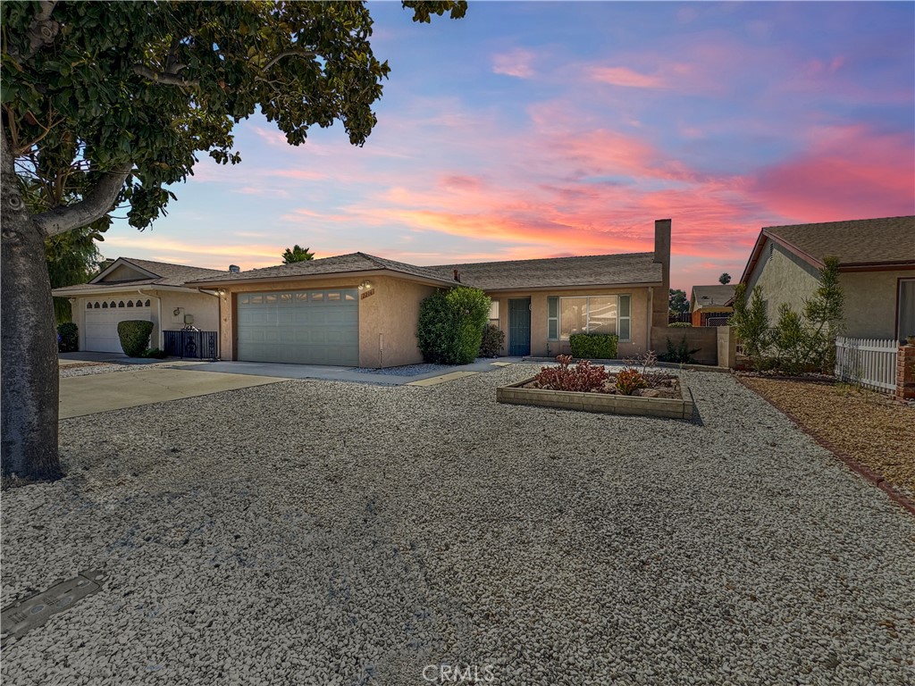 Welcome to El Grande Estates, one of the area’s most desirable 55+ communities where neighbors become friends and every day feels like a retreat. This beautifully maintained 2-bedroom, 2-bathroom home also features a flexible bonus space ideal for a home office, craft room or guest retreat. The large open floor plan creates a bright and welcoming feel, enhanced by fresh interior paint, new carpet and new windows in the bedrooms, cooling ceiling fans, and a smart Nest thermostat for year-round comfort. The family room and kitchen boast stylish wood-look ceramic tile flooring that blends beauty with easy care. A sunny enclosed sunroom expands your living area and offers the perfect spot to relax with a book or entertain guests. Outside, enjoy low-maintenance landscaping with decorative rock in the front yard and synthetic turf in the back so you can spend more time enjoying life and less time on upkeep. All major appliances, including the refrigerator, washer, and dryer are included with the sale, making your move-in effortless. Residents of El Grande Estates enjoy a friendly atmosphere with wonderful amenities: a community park, clubhouse with a full calendar of activities, shuffleboard and pool tables, and a large sparkling swimming pool—all for an impressively low HOA fee. Come experience the easy, active lifestyle you’ve been dreaming of in this inviting home!