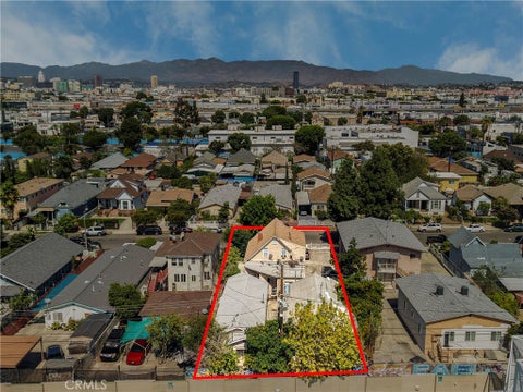 Photo of 1352 E 21st Street, Los Angeles, CA 90011 (MLS # SB26201918)