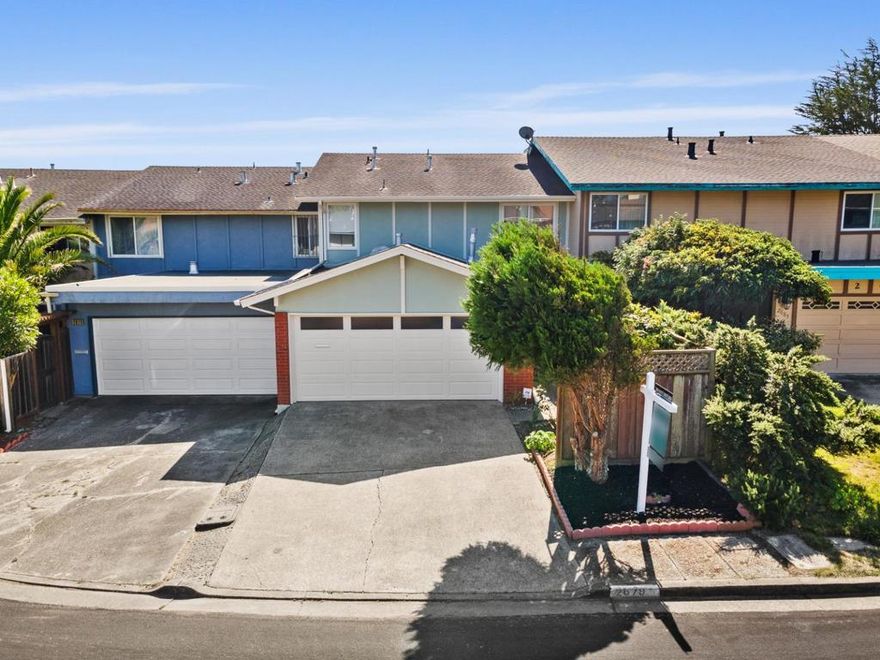 Welcome to 2679 Sean Court, a beautifully updated 3-bedroom, 2.5-bathroom home in the desirable Westborough neighborhood of South San Francisco. Filled with natural light, this home offers a thoughtful layout designed for comfort and functionality. The main level features a spacious living room with custom built-in TV cabinets, recessed lighting, and a cozy fireplace, with sliding glass doors opening to the backyard. The open kitchen offers granite countertops, ample cabinetry, recessed lighting, and plenty of prep space, flowing seamlessly to the dining area. A convenient half bath serves guests. Upstairs, the primary suite includes a spacious bedroom, custom walk-in closet, and ensuite with modern vanity and glass shower door. Two additional bedrooms share a hallway bathroom with updated vanity and shower-over-tub, and built-in hallway cabinets provide extra storage. The backyard offers a versatile space for entertaining or gardening. An attached two-car garage provides secure parking and storage. Minutes from Westborough Square, Serramonte Center, Costco, and local dining, with easy access to Highway 280 and Skyline Boulevard, this home combines modern updates, thoughtful design, and spacious interiors; a perfect place to call home.