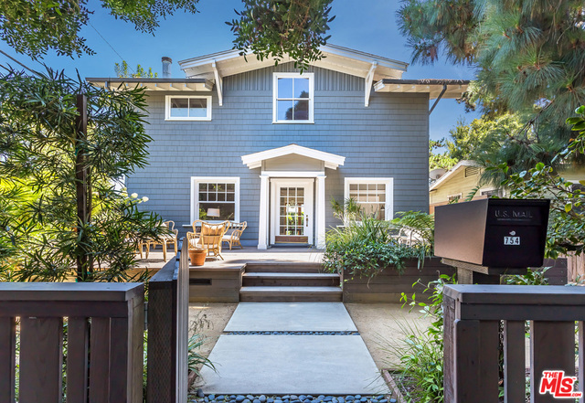 Located on a larger lot on the corner of Marco Place, this 3 bedroom home was the first project by renowned Venice Architect, Payson Denney, and boasts tasteful original details like a wood burning fireplace and Craftsman built-ins, as well as modern family upgrades like the custom La Cantina doors which marry your indoor living with your outdoor entertaining. Quiet morning coffee on your front porch, or late day tea in your sunny, grassy back yard? Decisions, decisions, decisions... but deciding on this exceedingly charming Walk Street home is easy! Upstairs you'll find two lofted bedrooms, each with its own bath, which evoke feelings of a European farmhouse. The detached rec room with attached 3/4 bath is perfect for a play room, home office, or as the private third bedroom. Next door, and potentially accessible, the converted garage, now used as an office, could possibly be an ADU or additional living space. Located in the heart of the walk streets & loaded with loving touches!