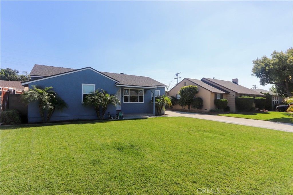 Photo of 12614 Gneiss Ave, Downey, CA 90242 (MLS # DW25238630)