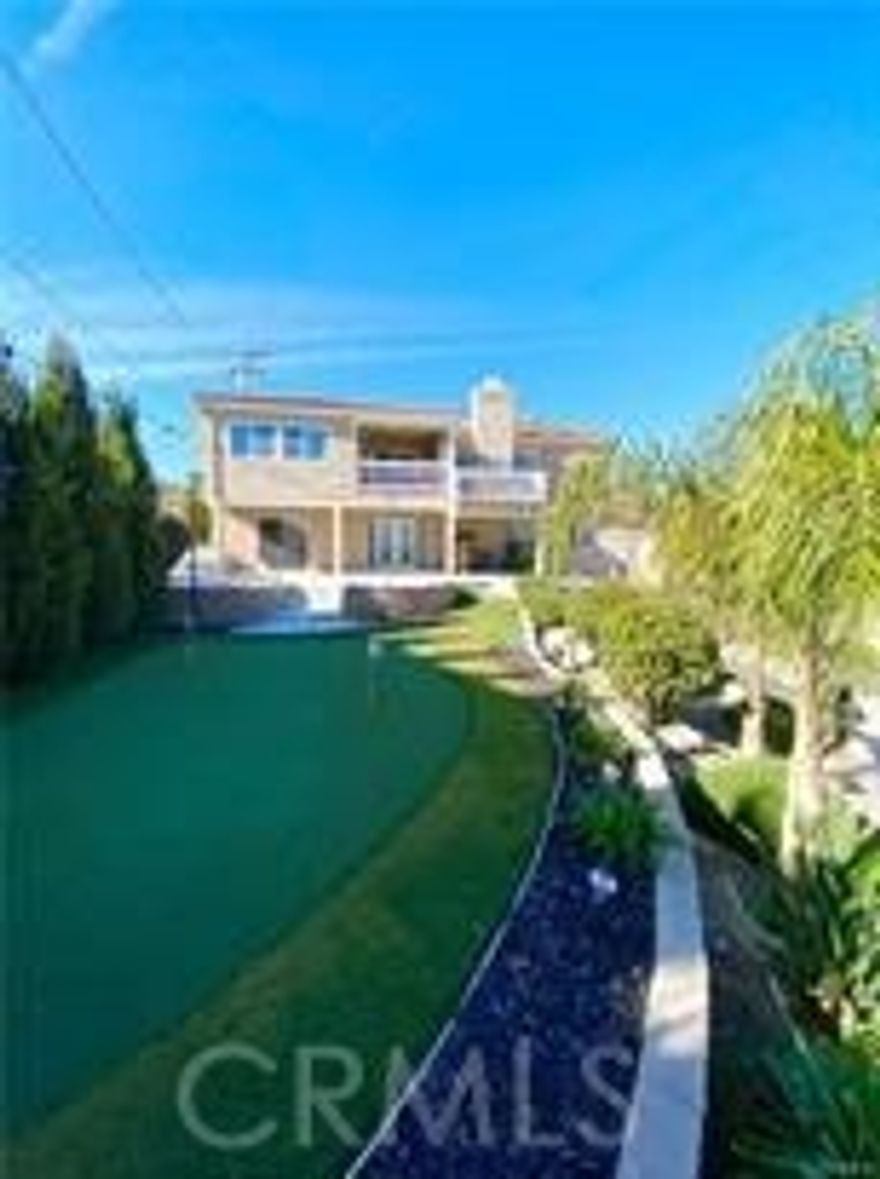 Beautiful bit of paradise on an extra-large lot. Gorgeous open floor plan, Large 3 Bedrooms, 3 Bathrooms, Open Kitchen with center island, Spa like walk in shower, Upstairs balcony just perfect for your morning sunrise, garage with epoxy flooring, French doors to open up to your gorgeous backyard, Stunning pool & spa with waterfalls & fire bowls, blue glass fire pit, Exotic bar, and a perfect entertainer's delight!