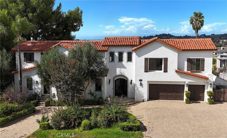 Views! Views! Views! The beautiful views with all the colors of the four seasons are within your sight. You can't imagine the beauty here! This beautiful Mediterranean-style country estate is located in a 24hr privately guarded community, renowned "The Country Estates" in Diamond Bar. This extraordinary property is spreads across 3 spacious floors. The main floor comprises two stories, a 6013sqft of permitted living space. When you access through a tall arched double door, you'll find a high-ceilinged foyer, an arched staircase with curved railings, a carved fireplace, exquisite chandeliers, a spacious kitchen and dining area, and a master suite with a private entrance that can be used as a mother-in law's suite or guest room… Passing through the living room, you arrive at an open deck and covered gazebo, and the beautiful views you can see is a highlight of your life here. Moving upstairs, there is a capacious master bedroom suite with walk-in closets. Four additional bedrooms, almost each bedroom with its own private bathroom. On the lower level, approximately 4,339 square feet offers endless possibilities. You can plan it into a space with entertainment room, family movie theater, gym, dining room, office, storage room… And there is also a bar, balcony, an indoor swimming pool, spa, and an expansive living room there. Moreover, this property has an outdoor swimming pool with a rest, shower, and changing area. This is your paradise for entertainment and gatherings with family and friends. The division of functional areas caters to the various needs of family members while maintaining private space. The beautiful view can be seen from every floor. You and your family can enjoy your leisure time and a vacation-style lifestyle here. This property also include a three-car garage, RV parking space, a circular driveway, horse stalls, over 1 acre of land, and a basement waiting for you to transform it into a wine cellar, storage room or others. The community where it is located is peaceful, with stunning scenery, and offers sports facilities, leisure hiking trails, playgrounds, and more. The location is excellent: minutes from Highways 57 and 60, close to restaurants, supermarkets, excellent schools, shopping centers, gym, and golf course. Where can you find such a home that can let you enjoy the convenience of the city while also the leisure of the countryside? Come here! Come and experience its extraordinary charm. Don't miss it!