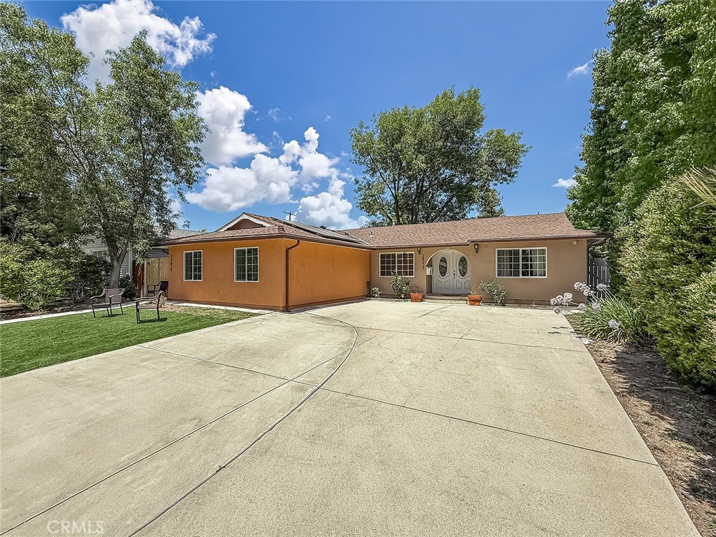 Beautiful Woodland Hills home with 5 bedrooms, 4 bathrooms and a newer built 1 Bedroom 1 Bath ADU. This is a single-story home that has been beautiful remodeled/updated. Inside features a bright open floor plan consisting of tile and laminate flooring, soaring high ceilings, recessed lighting, plus French windows. The home has a spacious living room, family room, a formal dining area and an upgraded kitchen with built-in stainless-steel appliances. Bathrooms have been remodeled. Bedrooms are bright and spacious. There is a Master bedroom with its own private ensuite bathroom. A great backyard to entertain guests or have large gatherings. The property has a newer sewer line and a tankless water heater. There is a Solar system. Great location! A must see