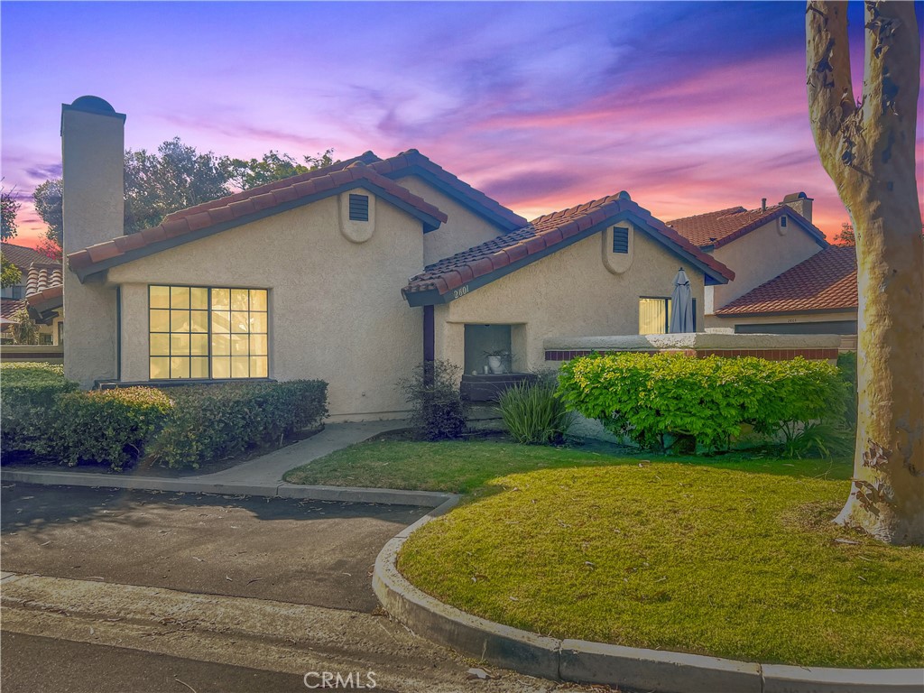 Move-in ready starting October 1st, 2025 +. Attached 2 car garage (access from dining room). All appliances are included (fridge, washer, dryer, microwave, stove /oven and dishwasher). Property is currently tenant occupied. Please do not disturb tenant. First-floor end-unit condo just minutes from the beach and harbor in vibrant Port Hueneme! This 2-bedroom, 2-bath home offers 1,126 sq. ft. of living space. Inside, enjoy laminate flooring throughout most areas, vaulted ceilings, and a cozy fireplace in the living room. The kitchen features stainless steel appliances, ample cabinetry, and tile countertops. The primary suite boasts dual closets and a remodeled bath with updated cabinetry, counters, and bath/shower. The secondary bedroom is served by an updated hall bath. Relax on the private enclosed patio and soak in the coastal air. Community amenities include a pool, spa, tennis courts, and clubhouse. Close to shops, restaurants, and beach access—this home is a must-see! No smoking.