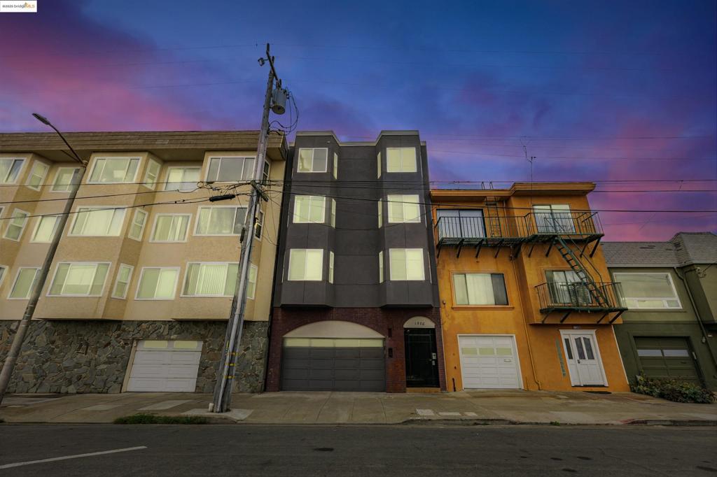 Oceanfront Penthouse with Unbeatable Views. Rare opportunity to own a spacious and elegantly updated 3-bed, 3-bath penthouse condominium located directly across from Ocean Beach in sought-after Outer Sunset neighborhood. This top-floor residence spans approximately 1,798 square feet and features an open-concept floor plan designed to showcase breathtaking direct views of the Pacific Ocean. The main living areas are appointed with refreshed hardwood flooring, while all bedrooms are comfortably carpeted. The fully equipped kitchen opens to the living and dining area, creating a seamless space ideal for entertaining. The home offers two distinctive primary suites, each with private decks offering stunning hill views, generous closet space, and en-suite bathrooms. Includes dedicated parking space. Ideally located from the Sunset Dunes, Golden Gate Park, and the Judah Muni line. This penthouse combines tranquil coastal living with easy access to public transportation, dining, shopping, and outdoor recreation.