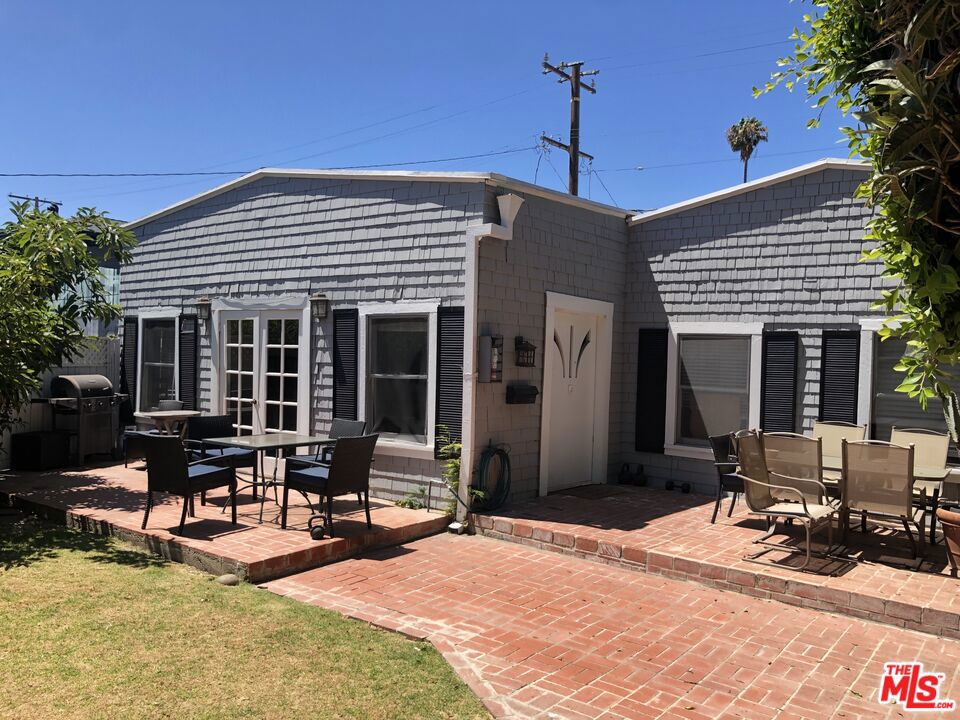 Renovated 4 bedroom/2 bath single family home like an "enchanted cottage" on one of the most prestigious "college" streets in prime northern Santa Monica. Private fenced property and located privately in the rear of a large property. Large brick patio in front with private grassy yard. Kitchen has stainless steel appliances, hardwood floors throughout. CENTRAL AIR AND WASHER/DRYER!! Ample closet space, one walk-in closet with room for office, 2-4 car parking (2 sets of tandem). High barrel ceilings in living room. Available September 20th. Great for families, roommates, pets! Best priced single family home in Santa Monica in a most coveted neighborhood steps from the best restaurants and shopping!