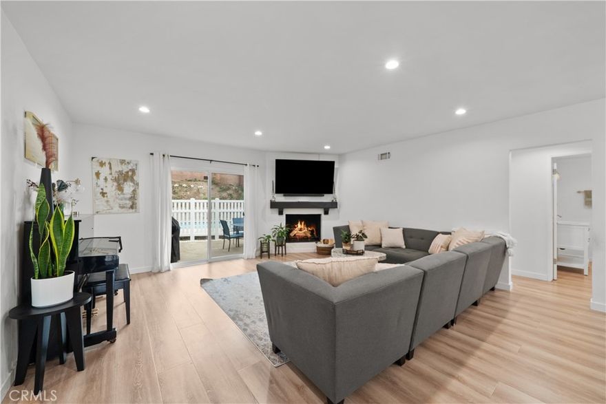 Welcome to this amazing private home tucked at the end of a quiet La Crescenta neighborhood cul-de-sac. This recently remodeled 3 bed / 2 bath oasis blends modern comfort with everyday serenity. Step inside to an airy, light-filled living space framing breathtaking mountain views with a designer newly upgraded kitchen as part of the heart of the home—expanded with abundant storage, sleek finishes, new appliances, and a roomy breakfast nook with its own view. All bedrooms and both bathrooms have been tastefully remodeled and upgrades include new windows and sliding doors, recessed lighting, new flooring, and an upgraded tankless water heater. Outdoor living shines here: an updated front porch/yard welcomes guests, while the private backyard showcases a sparkling pool, lounge space and patio for dining and play, and a new driveway gate for added privacy. Set on a tranquil street in one of La Crescenta’s most sought-after pockets—this is true pride of ownership and a home you’ll love from day one. This one will go fast so hurry!