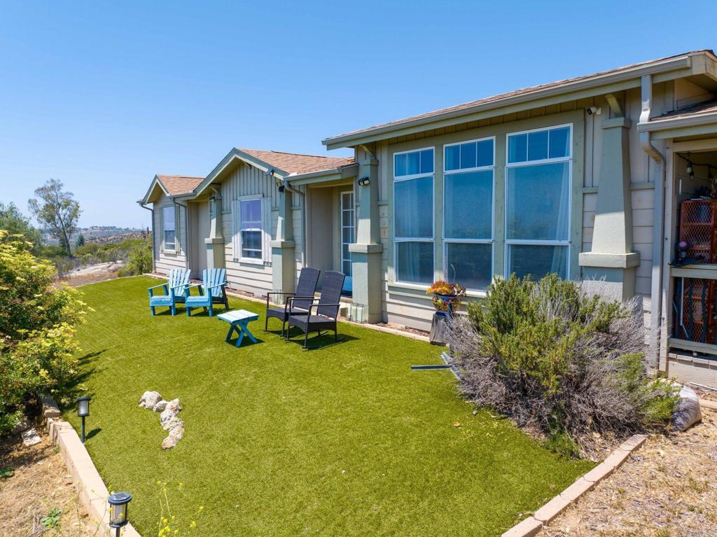 Welcome to your own slice of paradise on 8.9 sprawling acres—zoned for both agricultural and residential use. This beautifully maintained 3-bedroom, 2.5-bathroom home offers 2,412 square feet of living space, thoughtfully designed for both comfort and function. Enjoy the added bonus of a detached studio cabin just steps from the main house—ideal for guests, extended family, or a creative studio. The property also features sweeping panoramic views, private hiking trails, and space to breathe, grow, and thrive. With A72 General Agriculture zoning and an “O” Animal Designator, you’ll enjoy nearly unlimited possibilities—from equestrian use and farming ventures to a self-sustaining homestead. This estate is well equipped for rural living, complete with a newer well and generator—providing peace of mind, independence, and reliability year-round. If you’ve been dreaming of space, freedom, and potential, this is your rare opportunity to build your legacy in Ramona’s scenic countryside.