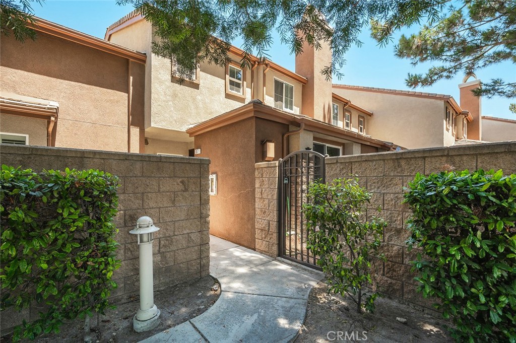 UNIT #37 – Beautiful unit in the GATED Woodside Townhome HOA * Formal entry to living room with fireplace, dining area and kitchen with glass slider out to private patio * Kitchen with granite counter tops and stainless steel appliances including range microwave oven, dishwasher and refrigerator * Three Bedrooms and 2.5 Baths, All bedroom upstairs * Upstairs laundry room with washer and dryer included * Private Patio * Two Car Direct Access Garage * HOA covers several of the amenities including access gates, gym, pool, club house, BBQ area, and playground * Appliances are as is.