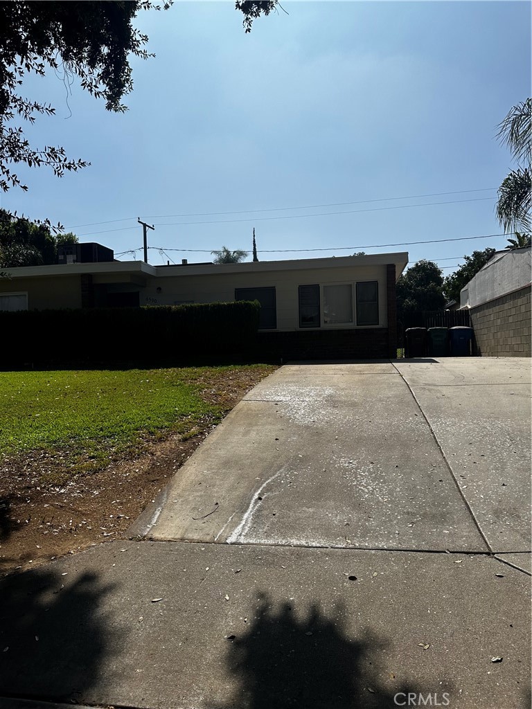 Charming 2-bedroom, 1-bathroom house situated on a picturesque tree-lined street. The home boasts spacious windows in the living room that offer a view of the backyard. It also includes a sizable backyard with a shed. Conveniently located close to shopping centers and the 91 freeway. Regrettably, pets are not allowed.