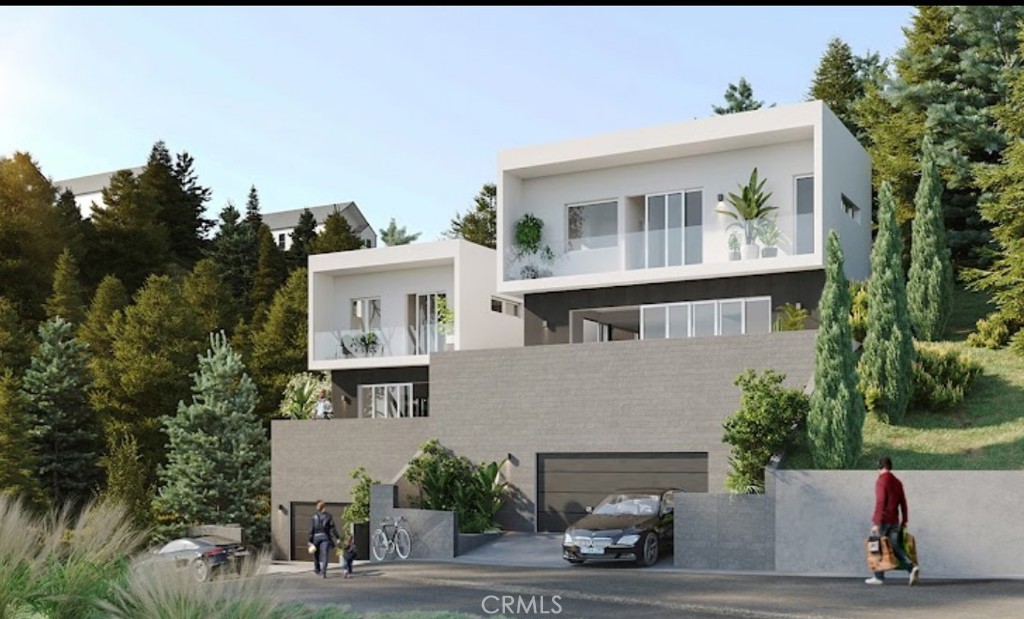 Perfect opportunity for a developer or owner-user to build in one of the most scenic hillside communities. Located in the desirable Highland Park area near Eagle Rock, this lot offers breathtaking panoramic views stretching from Downtown Los Angeles to Palos Verdes. Design a custom driveway leading to your view home and enjoy the serenity, privacy, and inspiration of hillside living. The seller has a conceptual drawing available for review featuring a 2-bedroom, 2.5-bathroom home with an attached 2-car garage and approximately 1,280 square feet of living space. Please note, the plans have not yet been submitted to or approved by the City of Los Angeles. The adjacent lot is also available for sale (MLS# AR25143814), offering added potential and flexibility for future development. This is an exceptional opportunity to build with scale, privacy, and unmatched views.