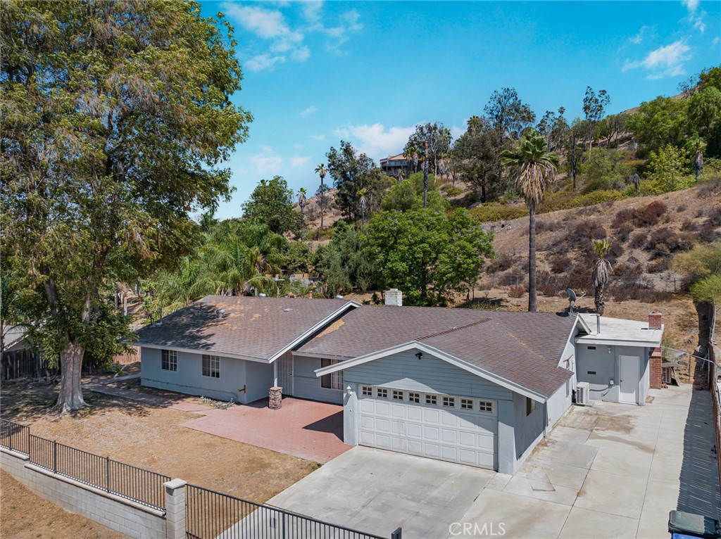 Long and wide private driveway up to this beautiful single story home nestled in the highly desirable community. Ranch-Style home, with 4 bedrooms and 2+ bathrooms. Open and extremely spacious floor plan. The kitchen features custom counter, providing a sleek and modern touch to the space. Huge bonus room with its own separate bathroom and pool access. It's also great for in-law suite and/or kids' playroom. Entertain friends and family with BBQ and swimming pool. Resort-like enjoyment in your own big backyard. This property is ideal for someone looking for a extra large lot. Conveniently located close to major freeways, parks, schools, restaurants and shopping.