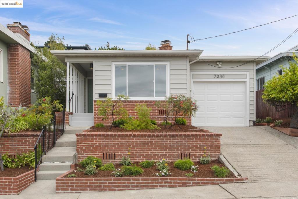 Home sweet home! This inviting El Cerrito gem is perfectly perched on Junction Ave & blends a peaceful outdoor lifestyle w/stylish interior touches. Golden hardwood floors & soft, neutral hues set a welcoming tone throughout. Sleek corner fp anchors the living room, where sunlight streams through a picture window that frames scenic images of the neighborhood. Dining area flows into a modern kitchen w/quartz countertops, decorative tile backsplash, a suite of stainless-steel appliances & ample cabinetry. Each comfortable retreat offers direct access to a private deck, plenty of closet space & a shared bath. Beautifully landscaped front & back yards provide the indoor-outdoor living we all crave. In the front, you will find multi-level brick-accented landscaping for great curb appeal. Terraced backyard will excite farm-to-table enthusiasts w/your 1st planter box w/ seasonal veggies. Enjoy privately or share with family & friends, multiple seating areas including the private deck, lower level & serene upper viewing terrace perfect for stargazing or enjoying peekaboo views of the bay. 1-car garage w/interior access. Minutes from Del Norte BART w/easy access to I-80 & other local freeways making this a launchpad to the best of the East Bay. This is the stuff dreams are made of!
