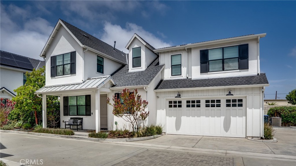 Welcome to Eastside Costa Mesa detached home built in 2017 Charm begins at the covered front porch! Step inside onto wood floors through out. Kitchen with center island, quartz counters, Bosch stainless appliances; 5 burner gas cooktop, single oven, dishwasher, and thoughtfully laid out storage.
Great room is filled with natural light from wall to wall patio slider doors. Built in cabinets flanking the gas burning fireplace in the great room. Dining room with seating for 8 or more. Custom window covers are included. Upstairs are 3 Bedrooms, Loft perfect for home office or 2nd living room space. Upstairs laundry room has full sized washer and dryer. Primary suite offers ceiling fan, walk in closet has been custom designed. Attached bathroom with walk in shower, dual sinks and toilet in private room with window. Other 2 bedrooms upstairs (1 with walk in closet), hall bathroom with illuminating mirror, shower over tub. Air conditioning. Direct access to the 2 car garage. Tankless water heater. Close to PCH, Ocean, Newport, night life and great freeway access to 405/73/55/133